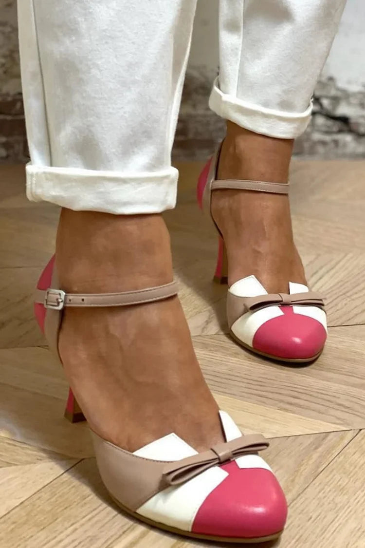 Talons aiguilles fuchsia bicolores à bout rond avec nœud à motif contrasté