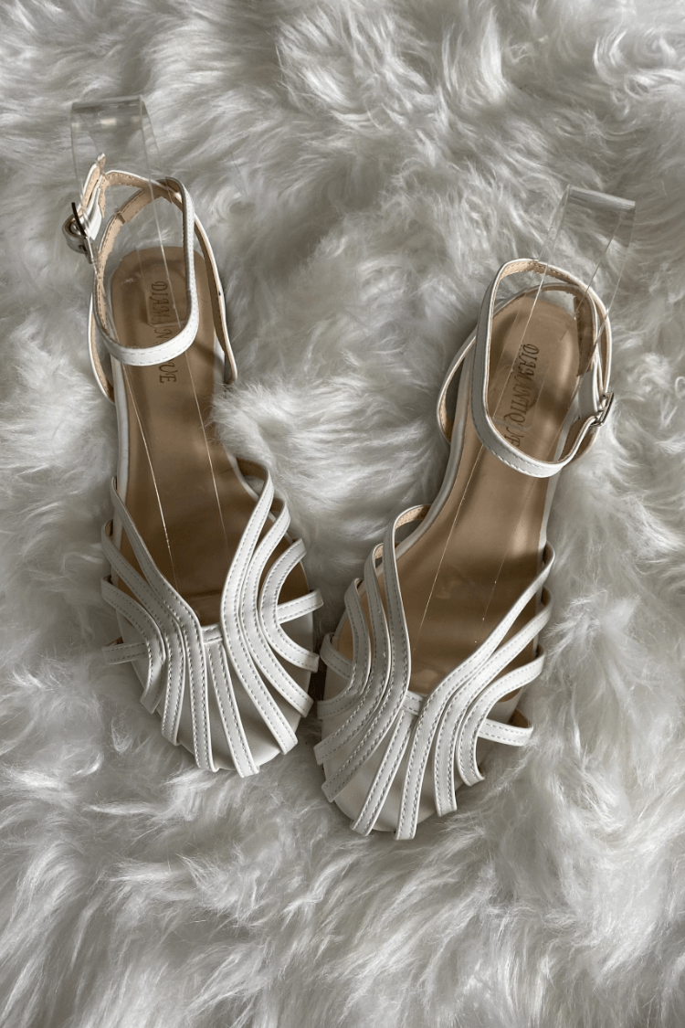 Ballerines unies à bout rond avec bride à la cheville