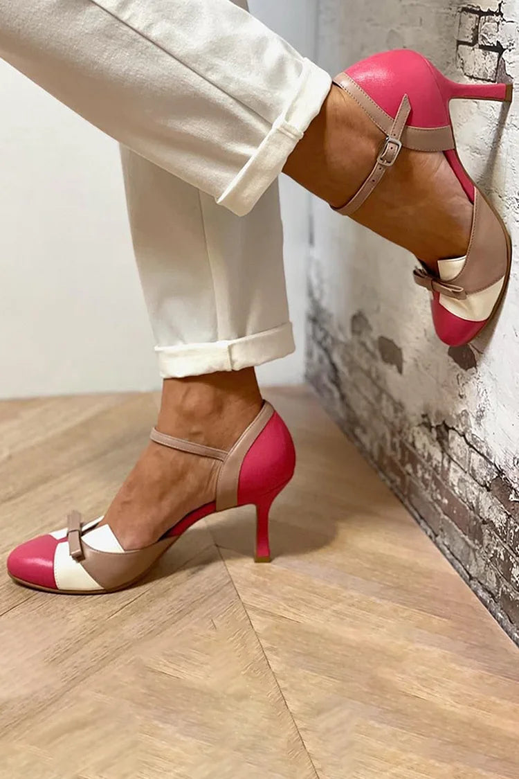 Talons aiguilles fuchsia bicolores à bout rond avec nœud à motif contrasté