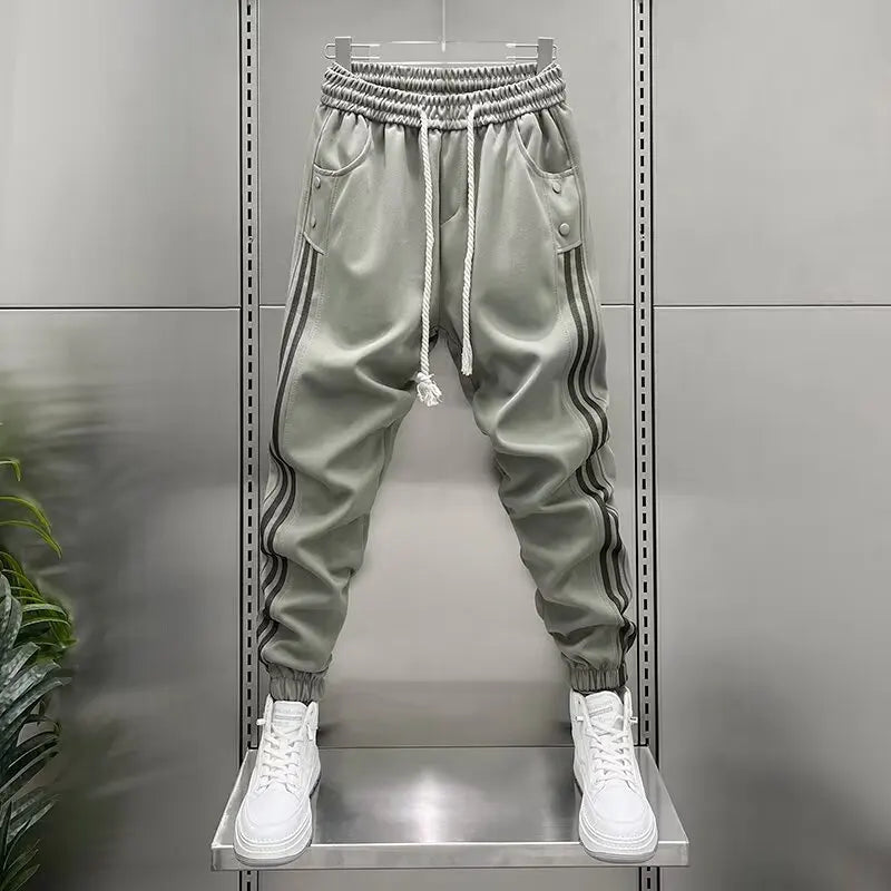 LAURENT MONACO | PANTALON DE JOGGING À RAYURES ÉLASTIQUES