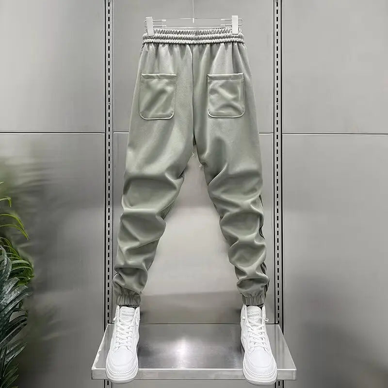 LAURENT MONACO | PANTALON DE JOGGING À RAYURES ÉLASTIQUES